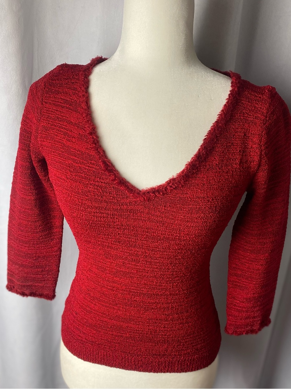 BETTE PAIGE knit top.